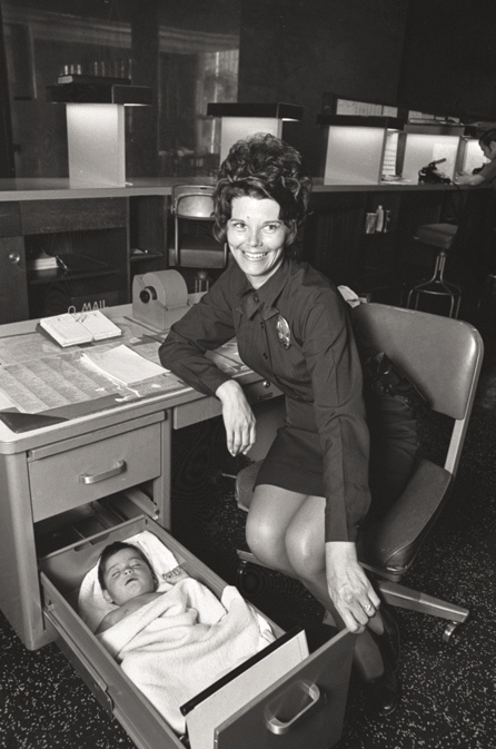 An abandoned baby sleeps peacefully in a drawer at the Los Angeles Police Station, 1971